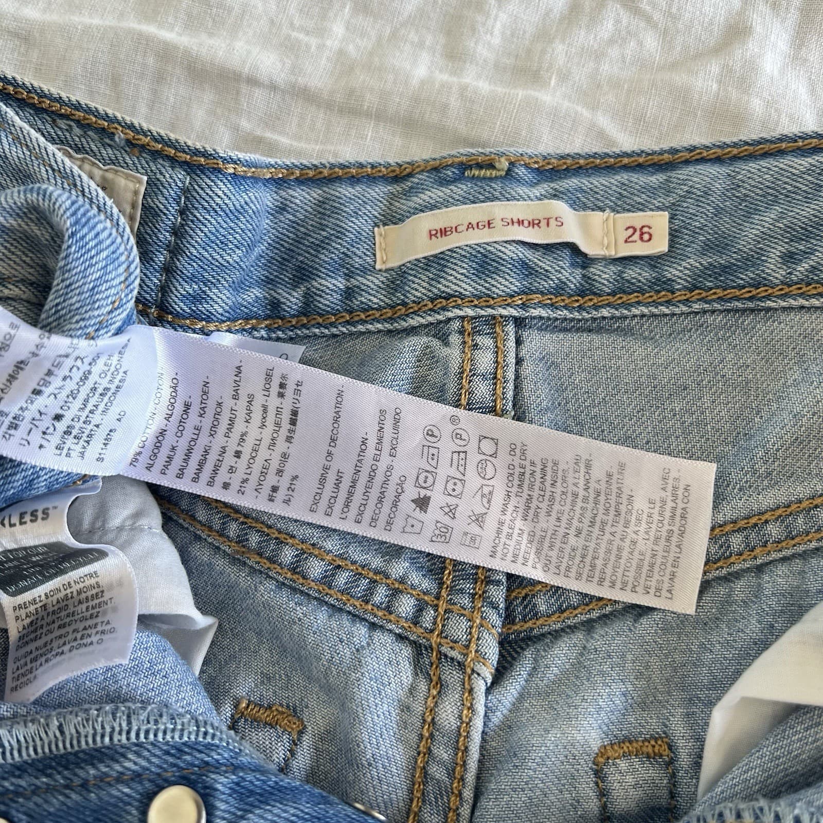 Levis Ribcage Denim Shorts W26 AU 8 High Waisted Light Blue Raw Hem Cut Off — photo 7 of 9