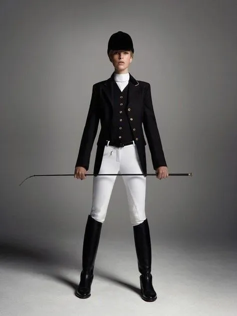 Equestrian aesthetic — This image is a perfect representation with the tailored black hacking jacket, white breeches, tall boots, stock tie, and hunt cap, embodying the polished riding-club uniform.