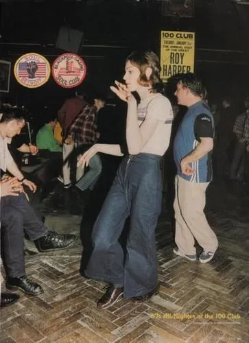 Northern Soul aesthetic — This image directly references the Wigan Casino and Blackpool Soul Club patches, the wide-leg trousers, and the all-nighter club atmosphere.