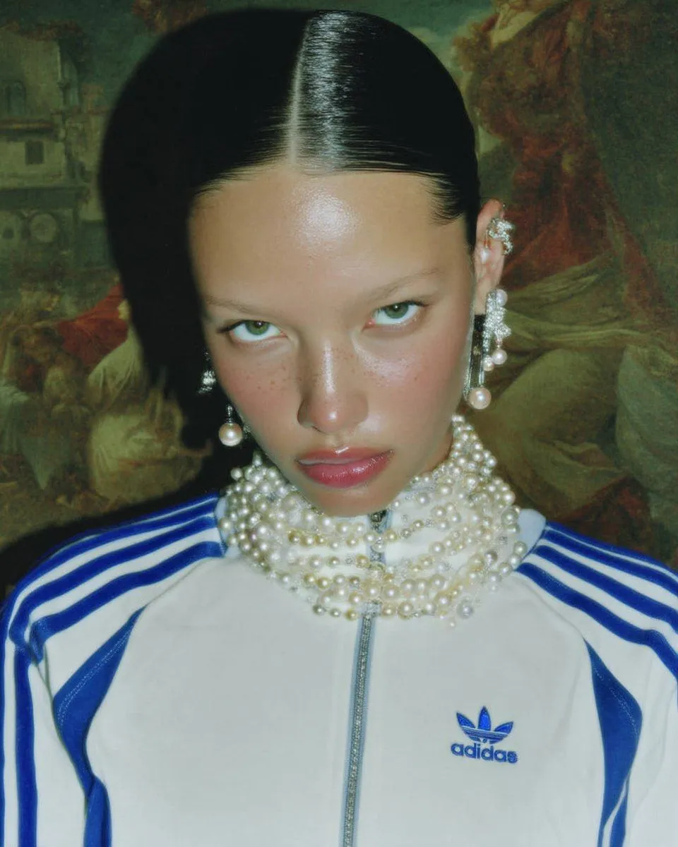 Pearlcore aesthetic — Features oversized baroque pearl ear cuffs, layered pearl necklaces, and a pearl-encrusted jacket detail, directly referencing Givenchy SS24 and the overall 'pearl-as-everything' trend.