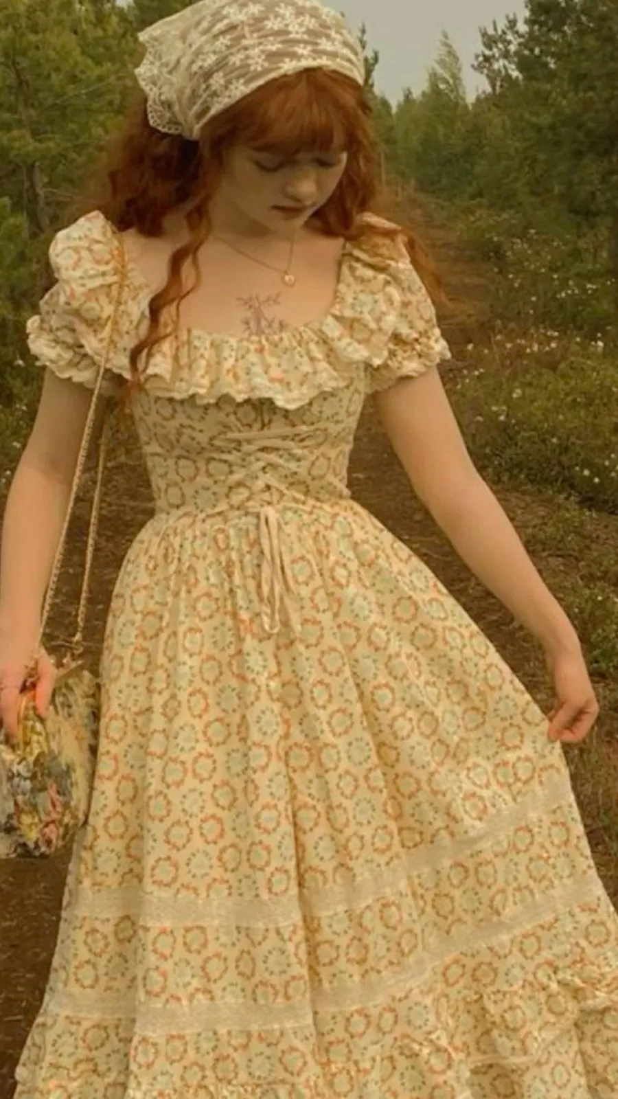 Regencycore aesthetic — The empire-waist dress with floral embroidery, puff sleeves, and the overall romantic, historical mood directly aligns with the Bridgerton-inspired Regencycore aesthetic.