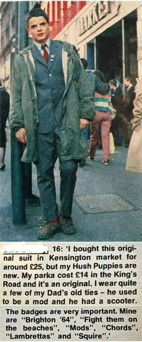 Suedehead aesthetic — The original text explicitly mentions a parka and suit, and the description of the outfit and its context (Kensington market, Hush Puppies) perfectly aligns with the Suedehead era and vibe.