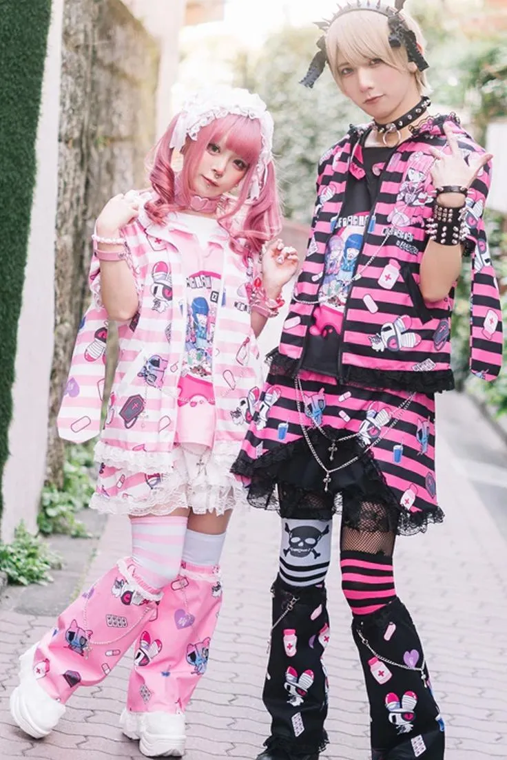 Yami Kawaii aesthetic — The matching outfits featuring pastel pink, bandage prints, pill graphics, and sad bunny motifs, along with the overall styling, are a perfect representation of the Yami Kawaii aesthetic.
